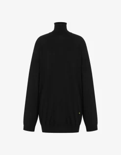 Moschino Wool sweater with cut-out Golden M